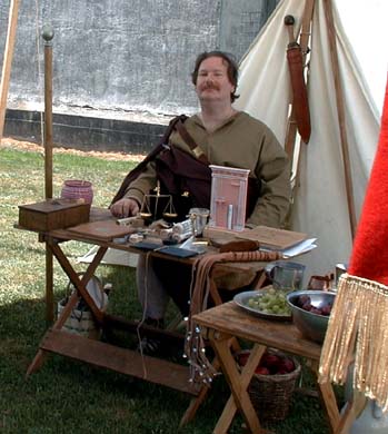Beneficiarius Lucas Cornelius Flavius (Richard Lucas) prepares to show to the public some everyday items used by the Romans.