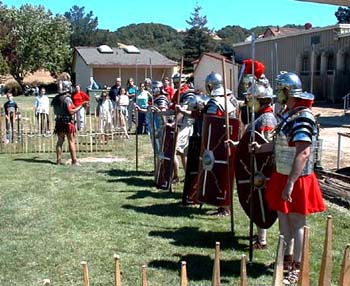 Centurio Marcus gives the troops last minute instructions before the pilum throwing demonstration at the Cheese Factory Event.